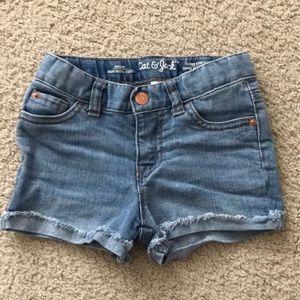 Girls 3t Cat and Jack jean shorts.